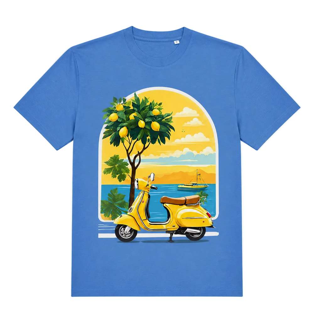 A blue short-sleeve crewneck t-shirt featuring a large graphic print on the front. The graphic depicts a yellow Vespa scooter parked in front of a lemon tree on a sunny coastal beach with a blue sea and sky.