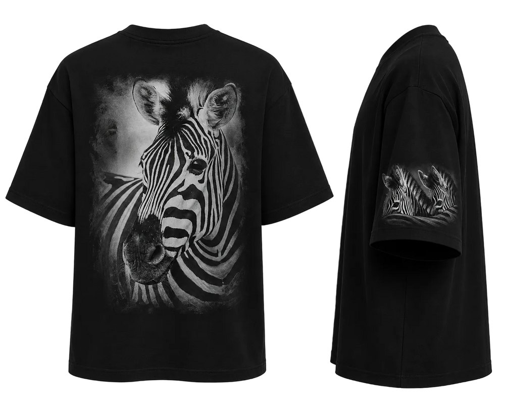 Black short-sleeve oversized t-shirt shown from the back and side, featuring a large grayscale zebra face graphic on the back and a smaller matching zebra graphic on the Leftsleeve.