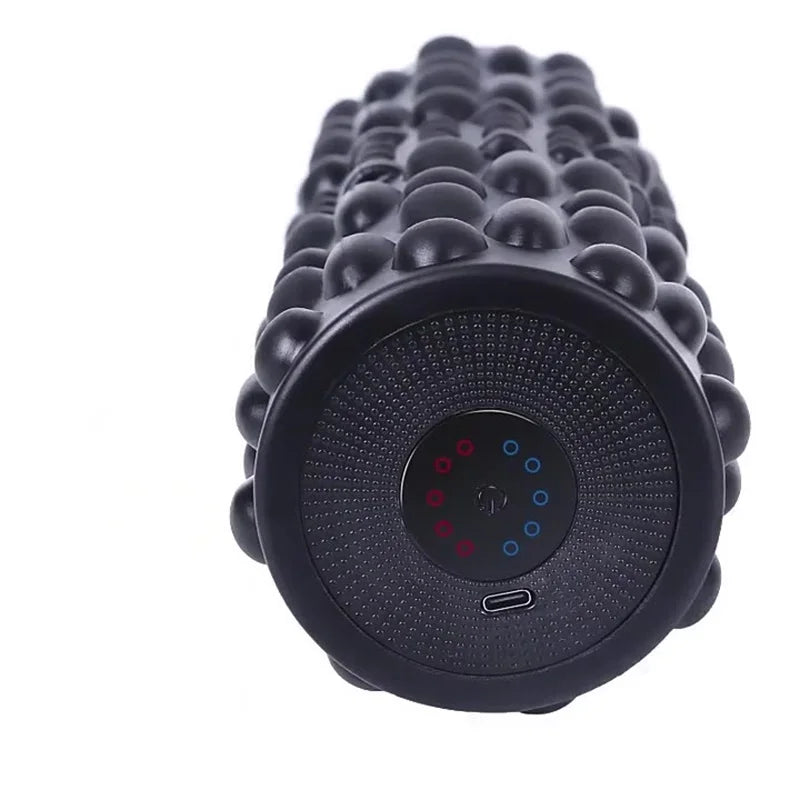 YUNEXA Electric Vibration Foam Roller in orange with ergonomic design for muscle relaxation and recovery.