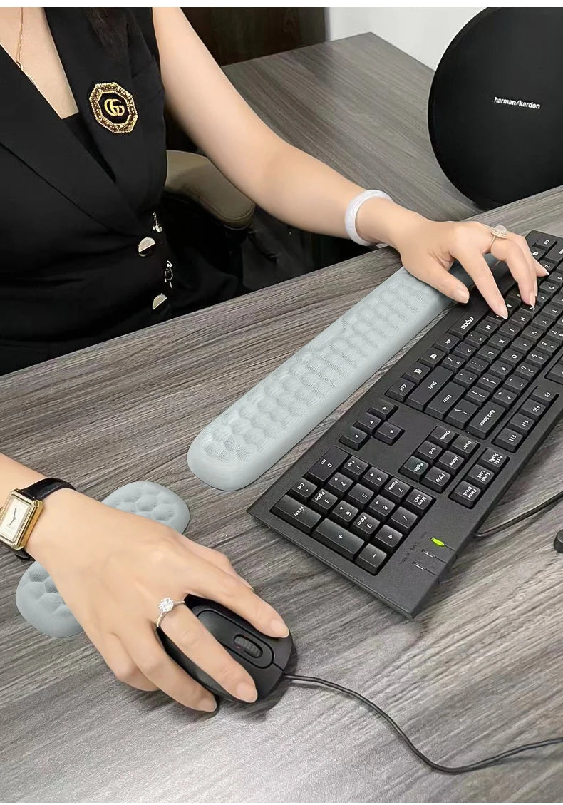 YUNEXA ergonomic keyboard and mouse wrist rest with memory foam and non-slip base for typing and gaming comfort.