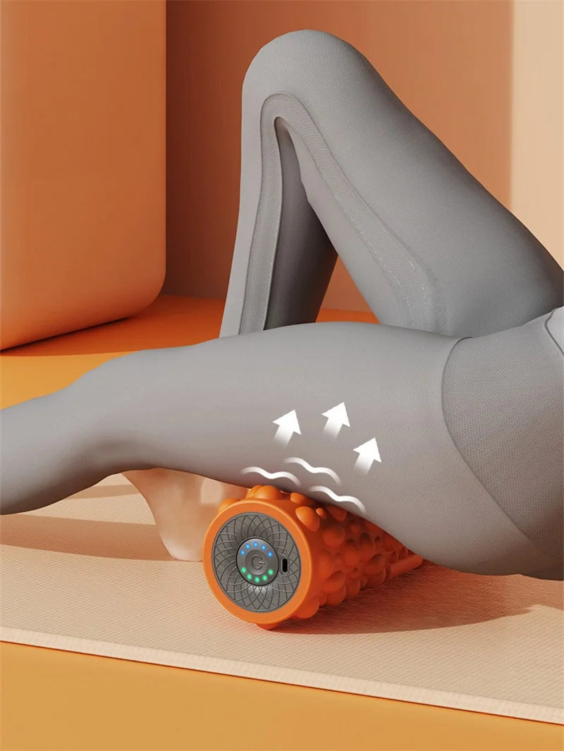 YUNEXA Electric Vibration Foam Roller in orange with ergonomic design for muscle relaxation and recovery.