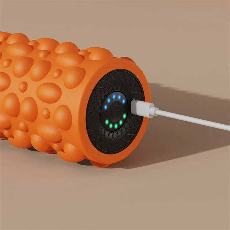 YUNEXA Electric Vibration Foam Roller in orange with ergonomic design for muscle relaxation and recovery.