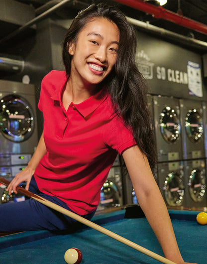 Women's eco polo shirt 65/35 worn by a model
