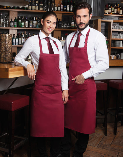 Custom bib apron with adjustable neck strap, worn