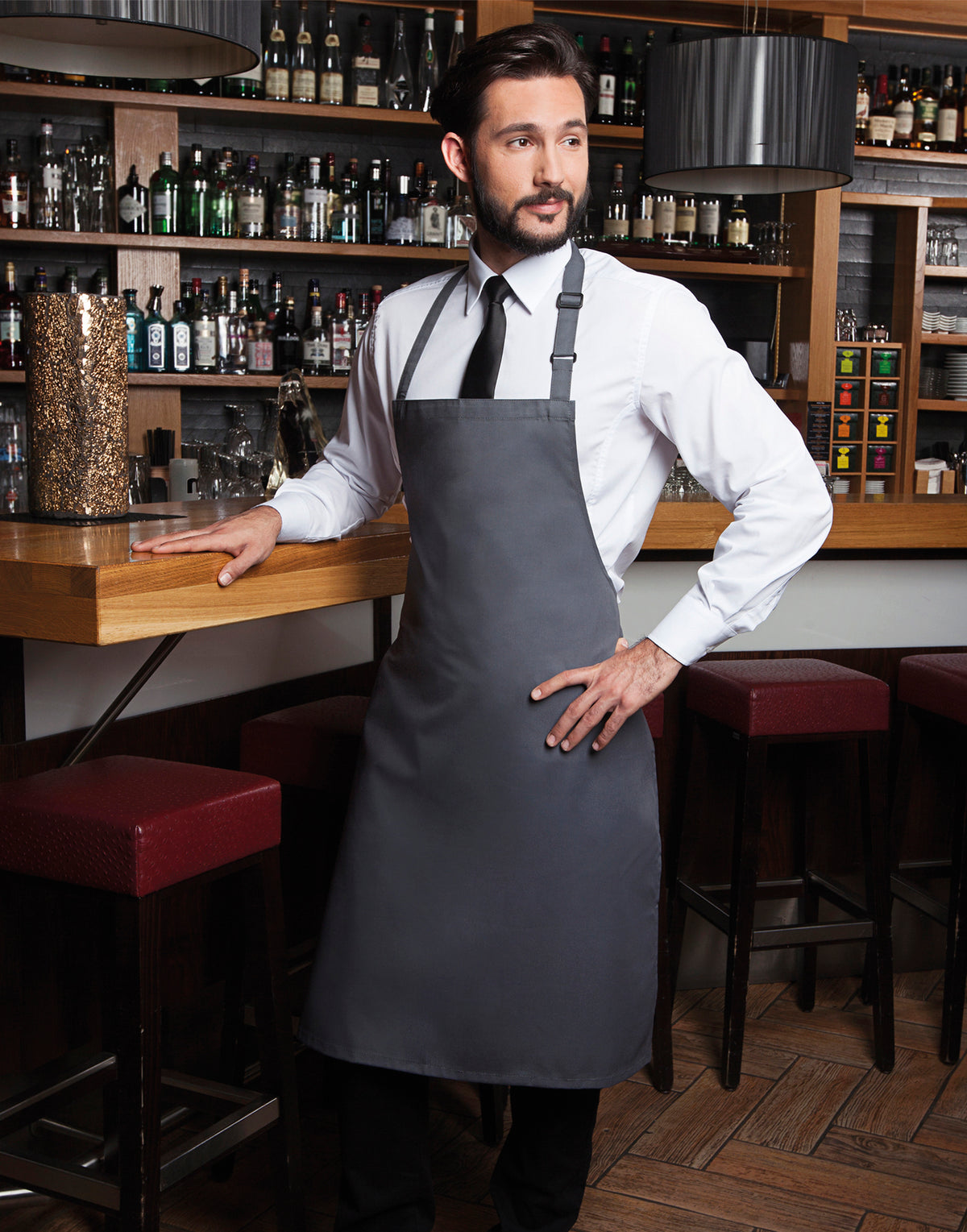 Custom bib apron in Anthracite, worn