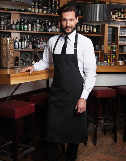 Custom bib apron in Black, worn